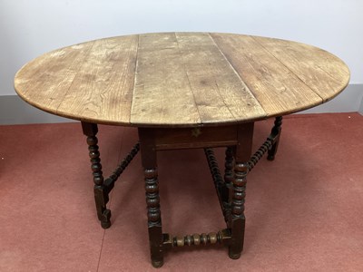 Lot 1425 - A Late XVII Century Joined Oak Drop Leaf Table,...