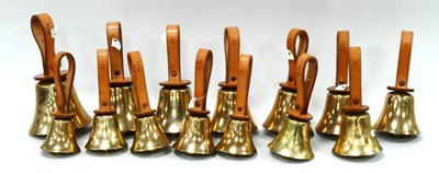 Lot 1315 - A Set of Fourteen Mears Brass Hand Bells, each...