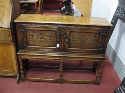 Lot 1511 - A XVII Century Style Oak Cabinet, with twin...