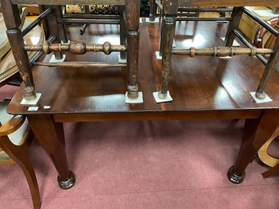 Lot 1550 - A XX Century Mahogany Wind Out Table, on...