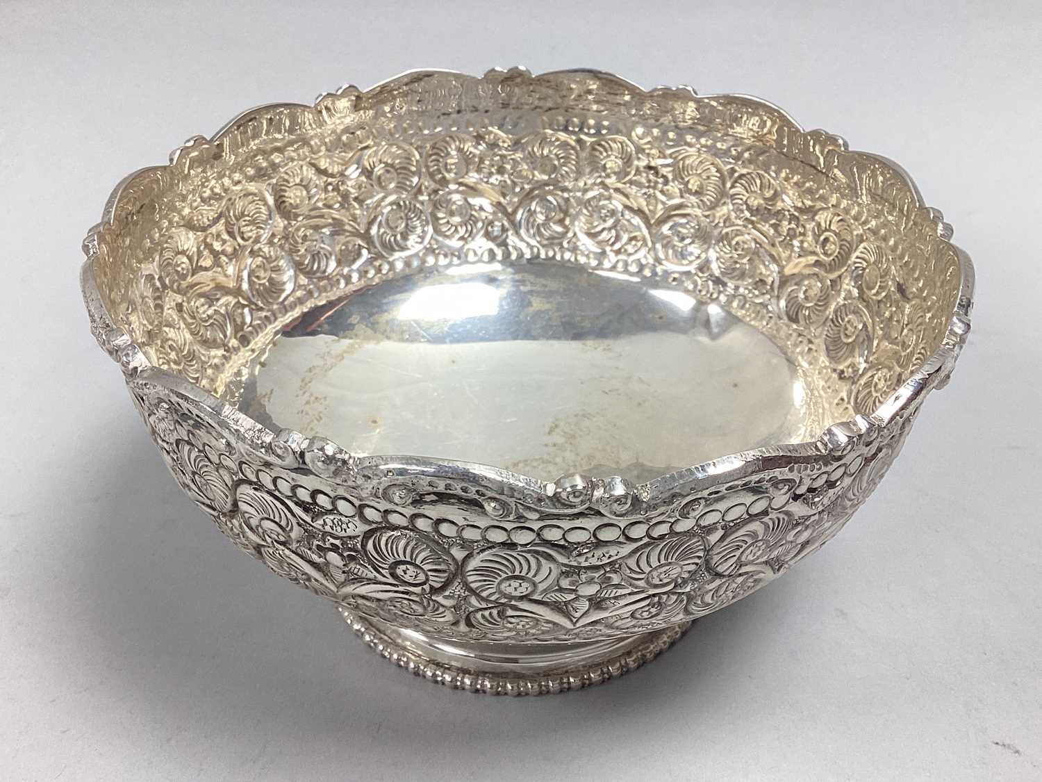 Lot 20 - A Middle Eastern Dish, with raised scroll edge...