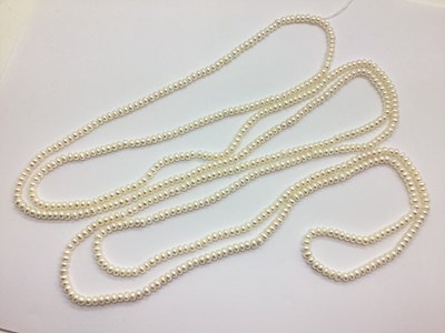 Lot 221 - A Button Shaped Pearl Bead Opera Length...