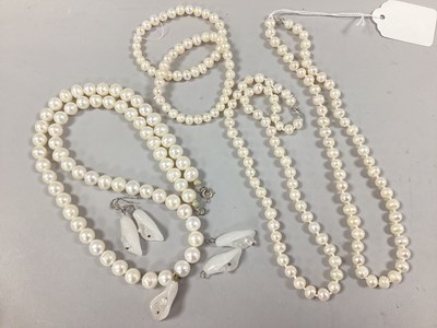 Lot 228 - A Modern Pearl Beaded Necklace, suspending...