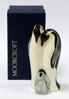 Lot 1069 - A Moorcroft Pottery 'Emperor Penguin' Group,...