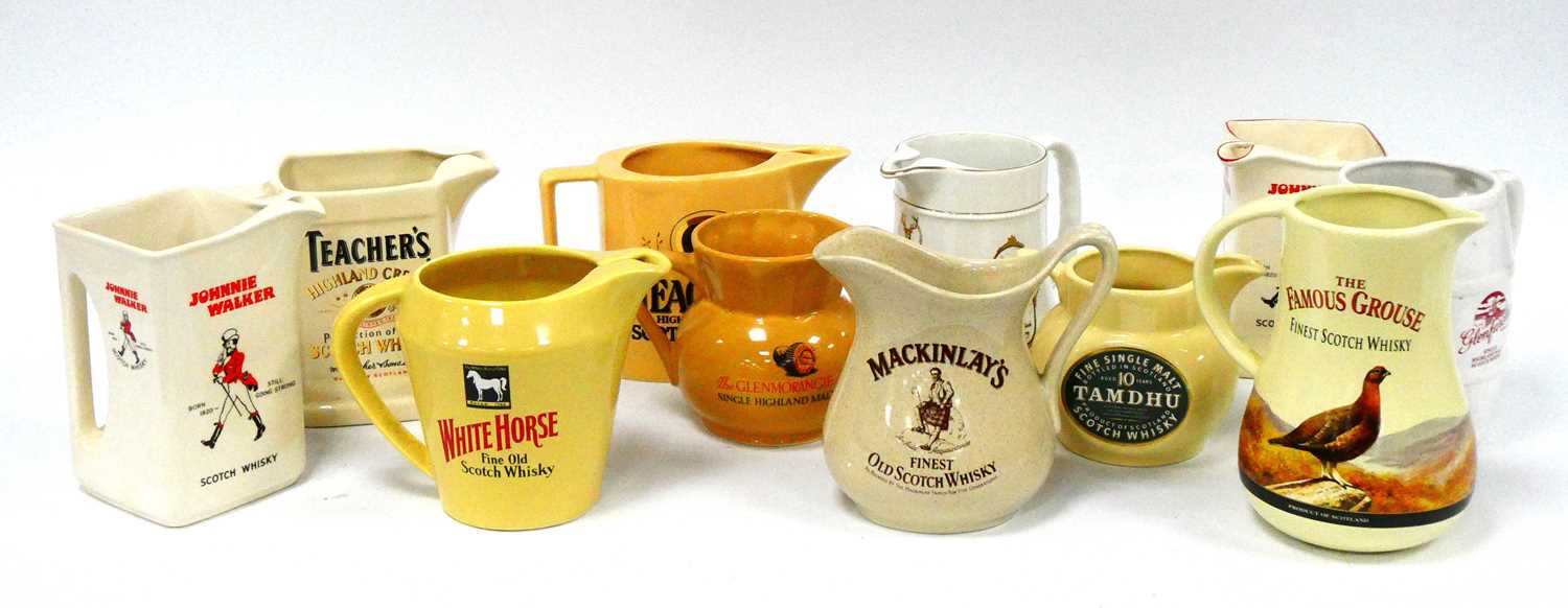 Lot 1348 - Whisky Water Jugs by Wade, Seton, etc,...