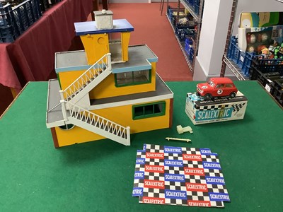 Lot 607 - A 1960s Slalextric No c/76 Mini Coopel in Red,...