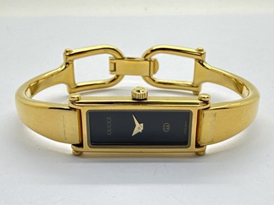 Lot 272 - Gucci; A 1500L Gold Plated Ladies Wristwatch,...