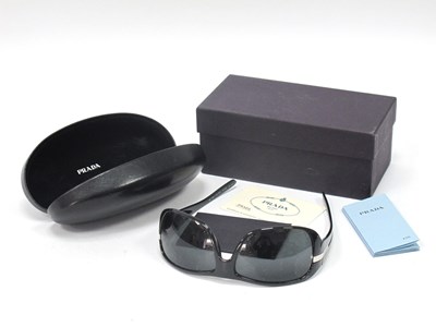 Lot 1337 - Prada; A Pair of Black Wraparound Style...