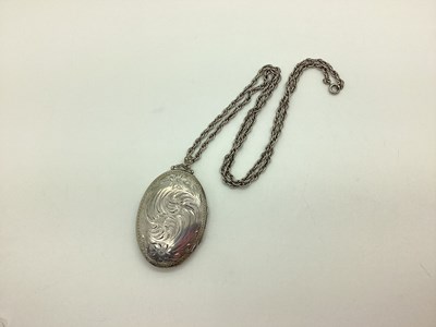 Lot 206 - A Large Oval Locket Pendant, with foliate...