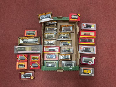 Lot 406 - Approximately thirty boxed 00 gauge wagons...