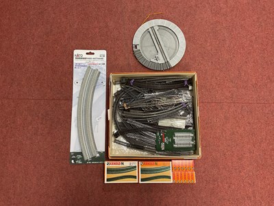 Lot 579 - A box of N gauge track by Peco and others...