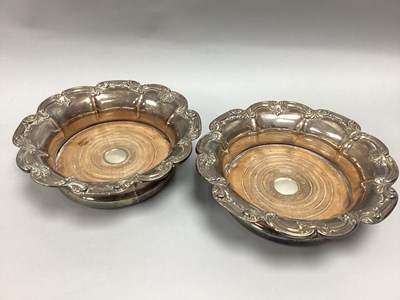 Lot 23 - A Pair of Plated on Copper Bottle Coasters,...