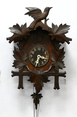 Lot 1405 - A Mid XX Century Cuckoo Clock, in the Black...