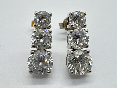 Lot 103 - A Pair of 9ct White Gold Three Stone Drop...