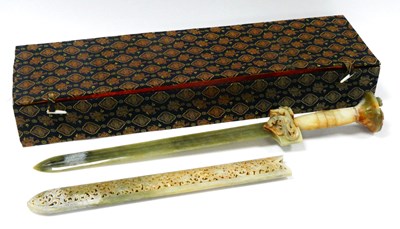 Lot 1095 - A Jadeite Sword, contained in a pierced sheath,...