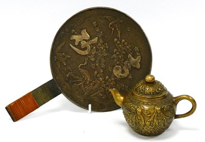 Lot 1087 - A Japanese Bronze Hand Mirror, one side with...