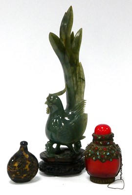 Lot 1089 - A Chinese Carved Green Agate Model of a Bird,...