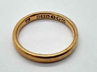Lot 69 - A 9ct Rose Gold Slim Wedding Band, of plain...