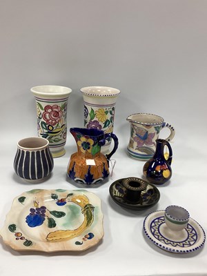 Lot 1202 - Poole Pottery Terracotta Egg Cup, on a wide...