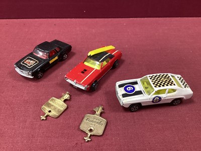 Lot 877 - Three Original James Bond OHMSS Corgi Rockets,...