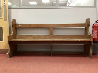 Lot 1499 - XIX Century Church Pew, with an open back and...