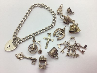 Lot 146 - A Curb Link Bracelet to Heart Shape Padlock...