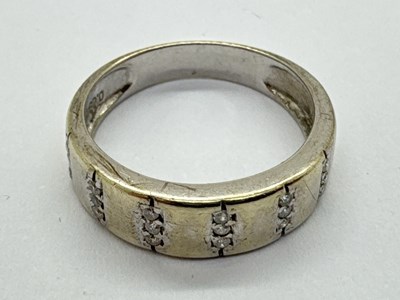Lot 66 - A Modern Diamond Set Band, set with rows of...