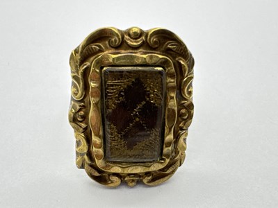 Lot 64 - An Antique Style Gilt and White Metal Mourning...