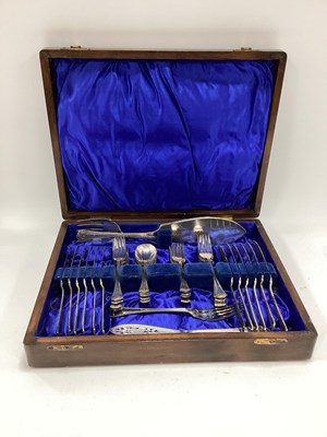 Lot 1281 - An Edwardian wooden-cased 40-piece cutlery set...
