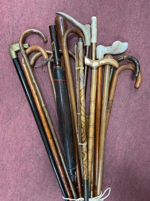Lot 1160 - A Large Quantity of Vintage Walking Sticks, an...