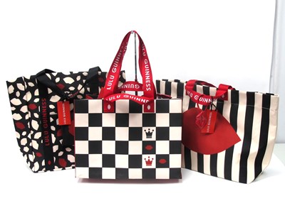 Lot 1321 - Lulu Guinness; A black and cream striped beach...