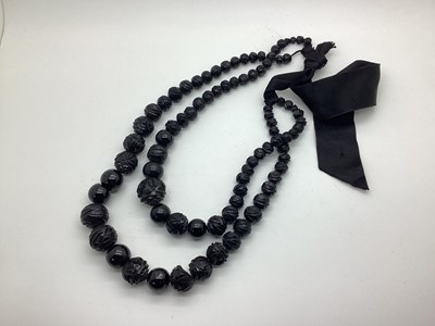 Lot 127 - A Victorian Faceted Black Bead Graduated Two...