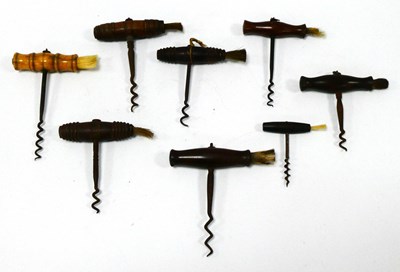 Lot 1209 - Eight Corkscrews, each with brush and bone or...