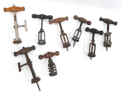 Lot 1212 - Eight Frame Type Corkscrews, with turned wood...