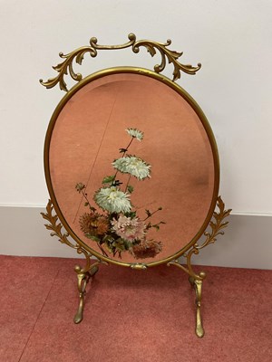 Lot 1461 - A Late Victorian Brass Framed Firescreen, the...