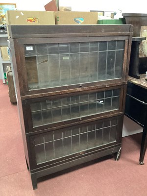 Lot 1514 - A Globe Wernicke Oak Three Section Bookcase,...