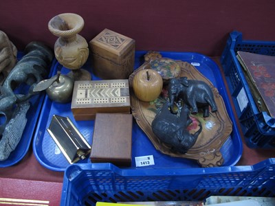 Lot 1413 - A carved wooden box containing two sets of...