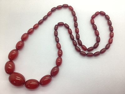 Lot 152 - A Cherry Amber Coloured Beaded Necklace, of...