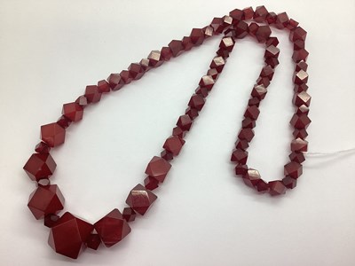 Lot 151 - A Cherry Amber Coloured Beaded Necklace, the...