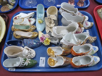 Lot 1264 - A collection of ceramic shoes to include Royal...