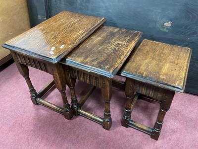 Lot 1563 - XX Century Oak Nest of Tables, with knurled...