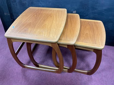 Lot 1567 - Nathan, nest of three teak coffee tables in...