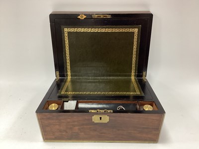 Lot 1348 - A wooden and brass bound writing slope, vacant...