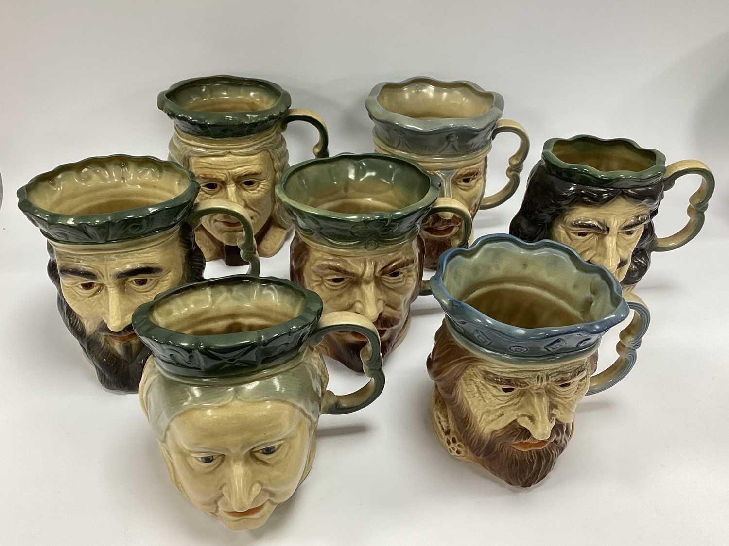 Lot 1201 - Seven Kingston Pottery Toby Jugs: 'Victoria,...