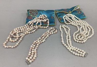 Lot 240 - A Multi-Coloured Pearl Bead Three Strand...