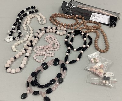 Lot 234 - An Assortment of Polished Hardstone Jewellery,...
