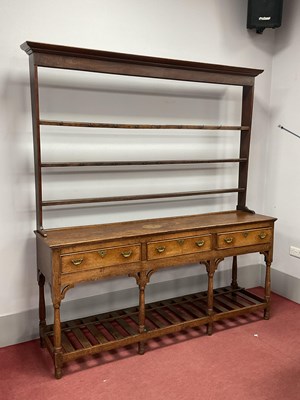 Lot 1572 - An XVIII Century Joined Oak Dresser, the rack...