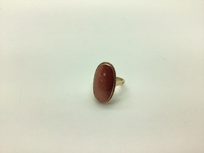 Lot 240 - A 9ct Gold Goldstone Oval Panel Ring, collet...