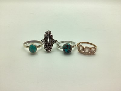 Lot 259 - A Modern 9ct Rose Gold Three Stone Dress Ring,...