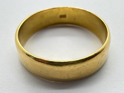 Lot 46 - A High Carat Plain Wedding Band, (indistinctly...